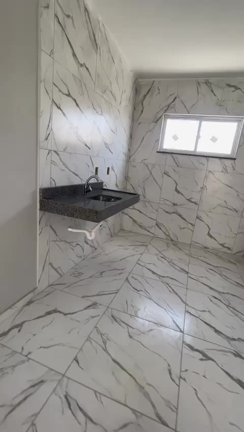 Cozinha revestida com bancada de granito