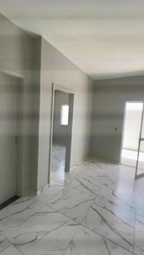 Sala com porcelanato marmorizado